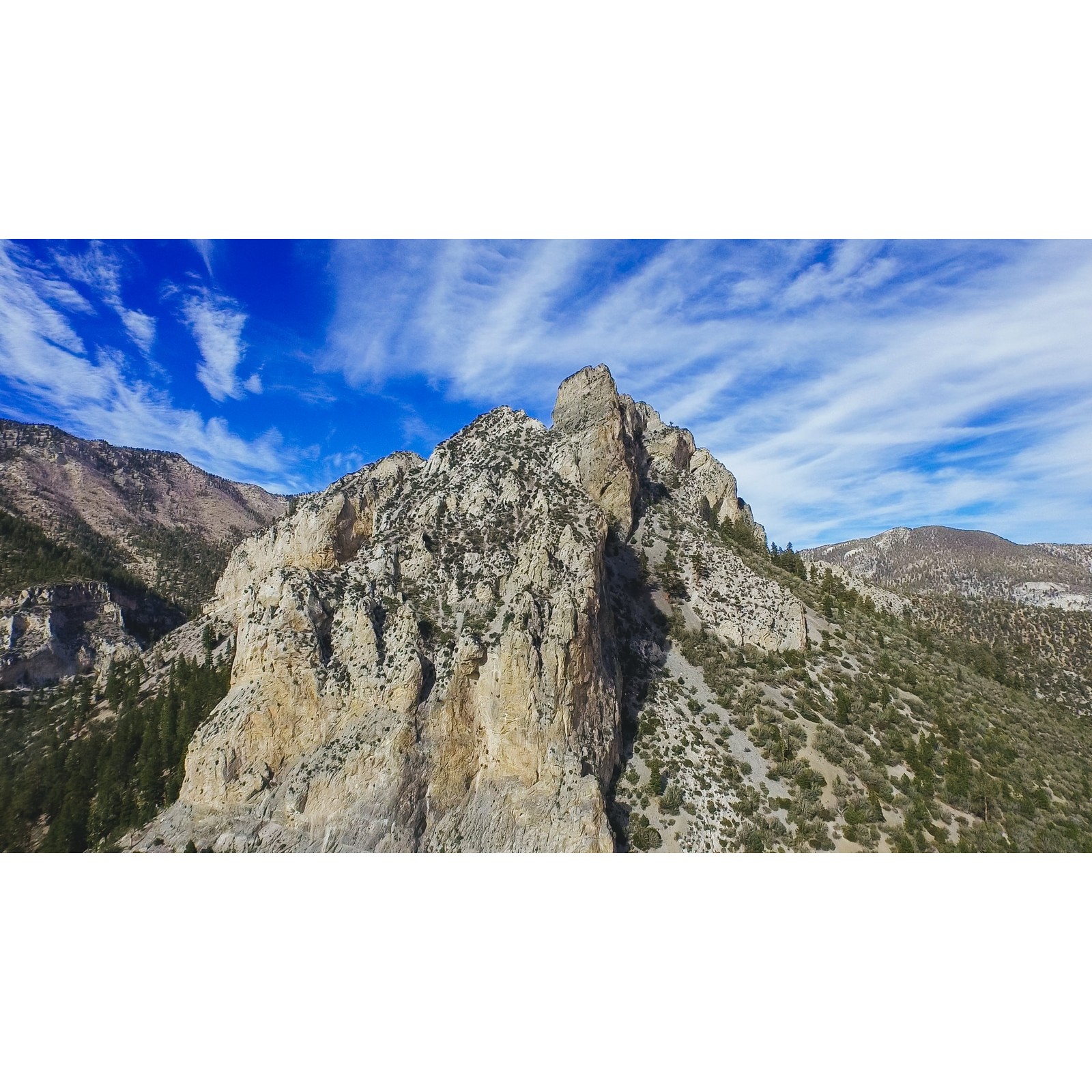 Mountain landscape centered on a white 1600 by 1600 pixel canvas